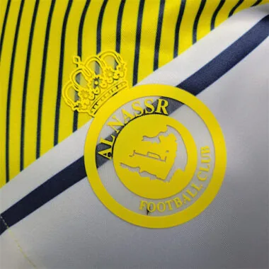 Polo amarillo del Al-Nassr de Arabia Saudí, 23-24