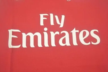 11-12 Arsenal home UCL fonts