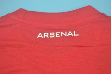 11-12 Arsenal home UCL fonts