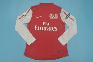 11-12 Arsenal home UCL fonts