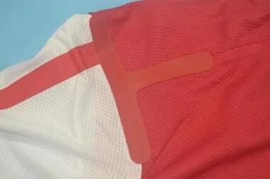 11-12 Arsenal home UCL fonts