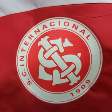 22-23 Giacca a vento Internacional rossa