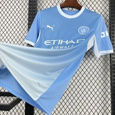 Fußball-T-Shirt im blauen Heimtrikot von Manchester City (Saison 26–27)