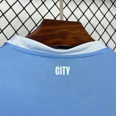Fußball-T-Shirt im blauen Heimtrikot von Manchester City (Saison 26–27)
