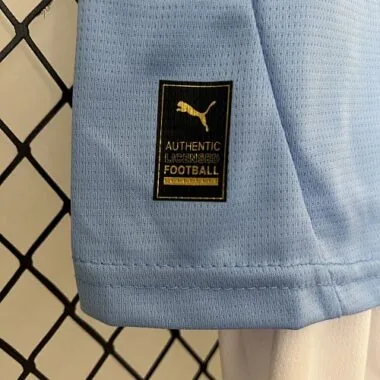 Equipamentos infantis do Manchester City para jogos em casa, 24-25 – Roupa para jovens