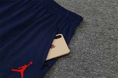 Polo Jordan PSG met saffierblauw-witte print