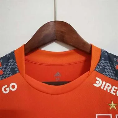 22-23 Oranje trainingspak van de Universiteit van Chili